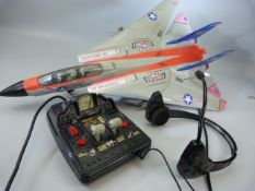 Electronic 'New Bright' F-14 Tomcat remote control plane. Appears to be in working order, moving and