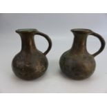 Pair of Bronze primitive jugs/ vessels