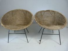 Two mid century wicker lazy chairs