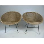 Two mid century wicker lazy chairs