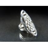 Silver Celtic style ring with pierced work panel.