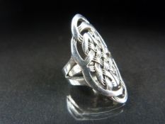 Silver Celtic style ring with pierced work panel.