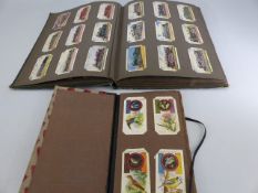 Two albums containing cigarette cards