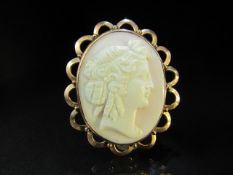 Unmarked Rose Gold Angel Coral Cameo brooch approx 42.25mm x 35.75mm wide female head facing right.