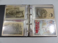 Album containing WW1 and WW2 military postcards