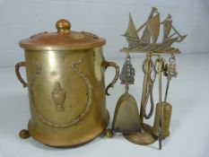 Unusual brass and copper ball footed coal scuttle of globular form with lid.