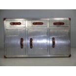 Modernist steel plated sideboard of cupboards and drawers