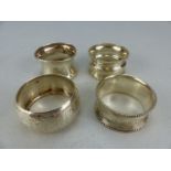 Four hallmarked silver napkin rings total weight approx 75g)