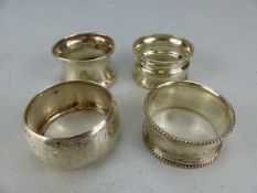 Four hallmarked silver napkin rings total weight approx 75g)