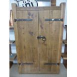 Large planked wooden pantry cupboard in the Rustic Style