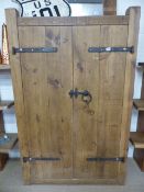 Large planked wooden pantry cupboard in the Rustic Style