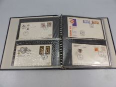 Album containing first day covers