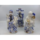 Three oriental china figures depicting the Deities