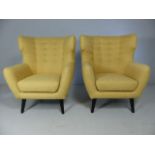 Mustard wingback modern armchairs by Made.com