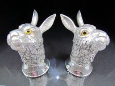 Pair of condiments in the form of rabbits with glass eyes stamped 800