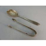 Pair of silver hallmarked sugar nips and a silver hallmarked fruit spoon dated 1897 maker G ? D F