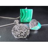 Three silver pendants on chains - 1) Malachite square set with two small stones and hung from 18"