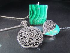 Three silver pendants on chains - 1) Malachite square set with two small stones and hung from 18"