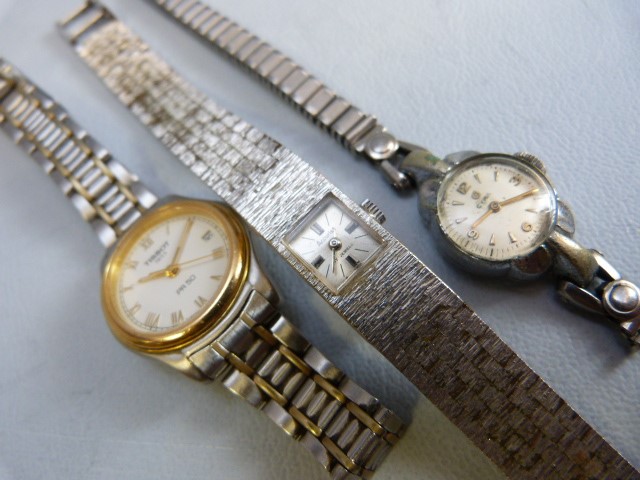 Three ladies silver coloured metal wrist watches. Two dress watches A/F by Accurist & CYMA and a - Image 6 of 9