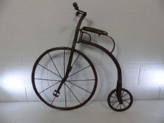 Miniature Penny Farthing model bike.