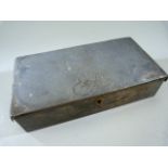 Oriental Pewter box with single marking to front. Lightly decorated with flowers to top.