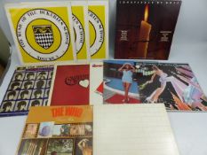 Nice selection of Rock N Roll records to include Pink Floyd - brick wall, A Hard Day's night - the