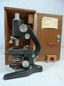 Watson Barnet Cased microscope with chrome mounts and paperwork to door.