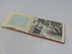 Autograph book containing signed autographs by: Peter Bonetti; Steve Perryman; signed photo James