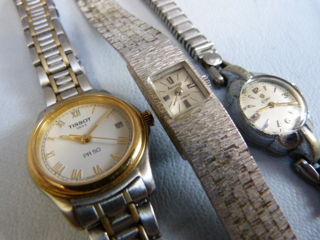 Three ladies silver coloured metal wrist watches. Two dress watches A/F by Accurist & CYMA and a - Image 7 of 9