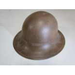 Military interest: Metal helmet with lace detail and liner