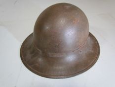 Military interest: Metal helmet with lace detail and liner