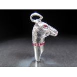 Silver (sterling) whistle in the form of a horse set with a ruby collar