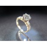 8K Yellow Gold Diamond Ring approx 1.5ct spread measuring approx 7.1mm in Diameter. Flanked by 4