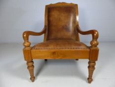 Large veranda chair with leather seat and large sloping open arms