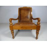 Large veranda chair with leather seat and large sloping open arms
