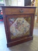 Edwardian inlaid pier cabinet with crewel work panel to door.