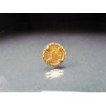 Chinese Gold Proof coin 5 Yuan .999 gold. Set in a gold coloured mount. Approx weight 2.5g