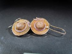 Pair of Wirework earrings in the form of sunhats