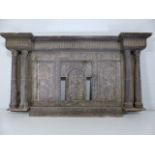 Antique heavily carved wall piece with pillared sides