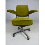 Tansad - An industrial swivel chair in need of re-upholstering.