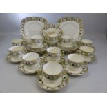Paragon mid century teaset decorated in Yello and Black with scenes of ladies and Gentlemen