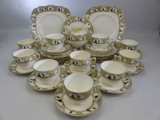 Paragon mid century teaset decorated in Yello and Black with scenes of ladies and Gentlemen