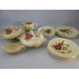 Clarice Cliff - Reg No 840076 part dinner service decorated with floral sprigs. Comprising plates,
