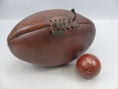 Leather modern rugby ball and a cricket ball