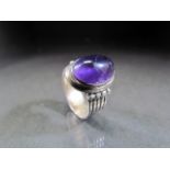Silver 925 ring set with an approx 14.5mm x 10.25mm Cabochon Amethyst.