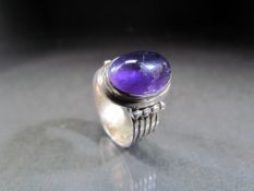 Silver 925 ring set with an approx 14.5mm x 10.25mm Cabochon Amethyst.