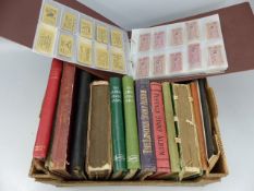 Tray containing various vintage stamp albums