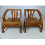 Unusual wooden pair of single armchair with sloped arms