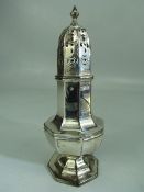 Hallmarked silver sugar Shaker with pierced work top. Hallmarks for Chester 1908, Martin, Hall &