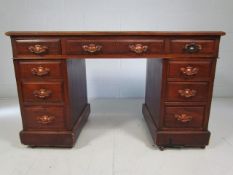 Mahogany pedestal desk with Art Nouveau style handles